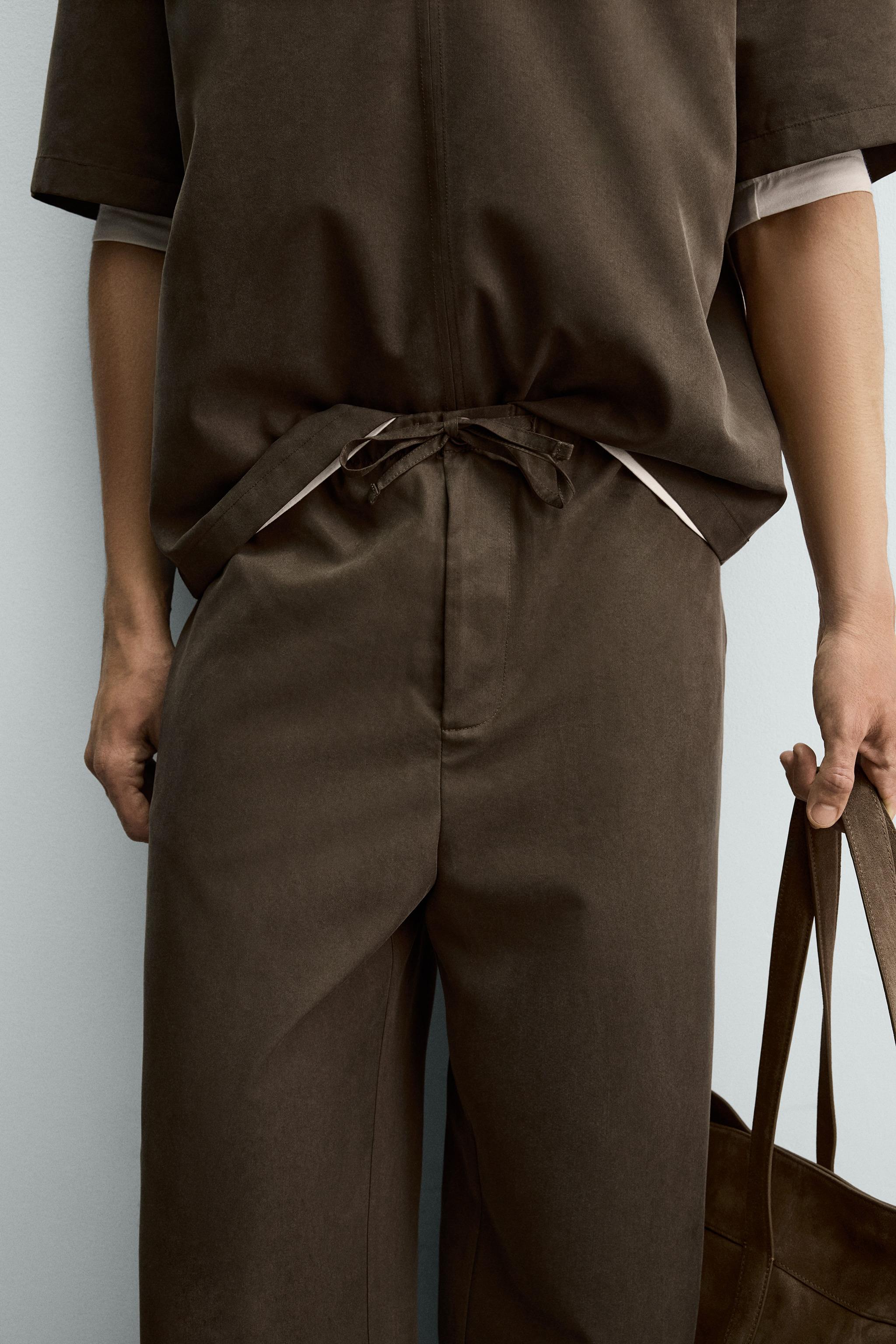 FLOWY WIDE FIT PANTS